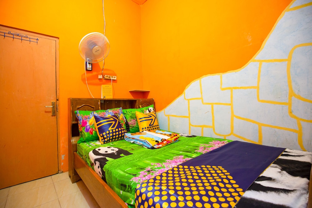 SPOT ON 1762 Gandrung Payungan Family Inn 24/26