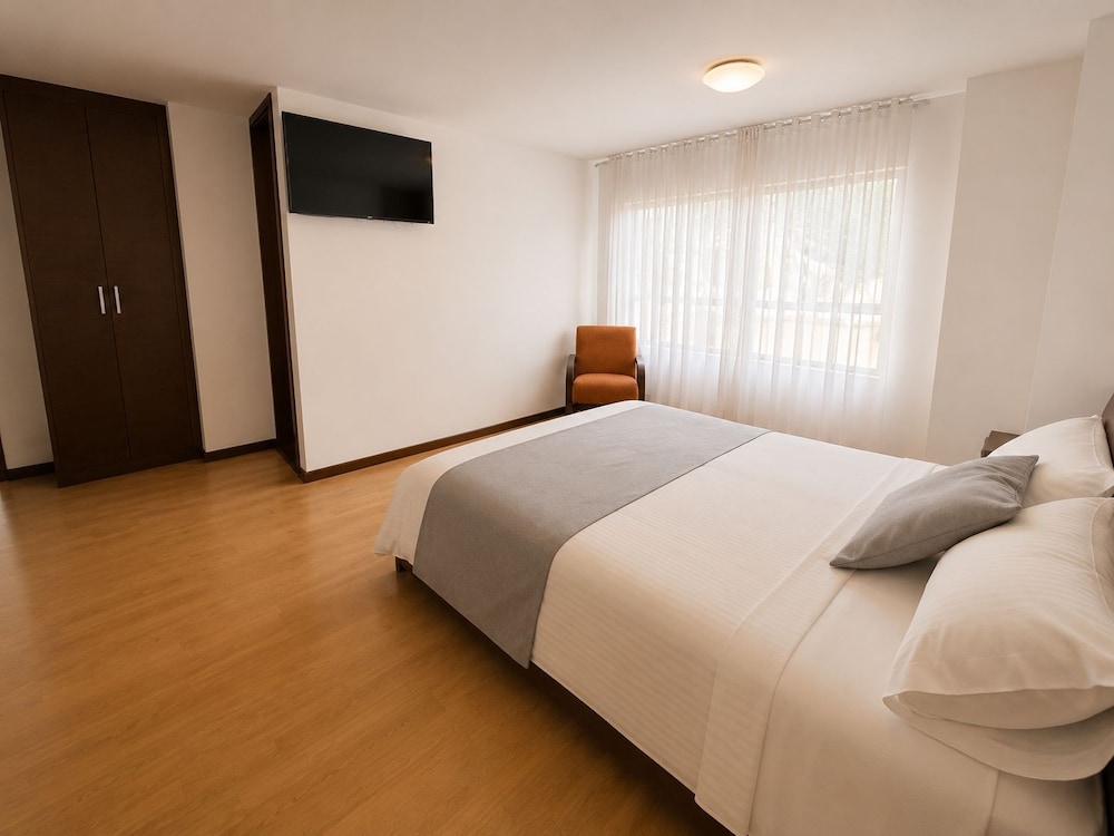 غرفة بسرير كوين، Nogal Suite Hotel Pasto 7/10