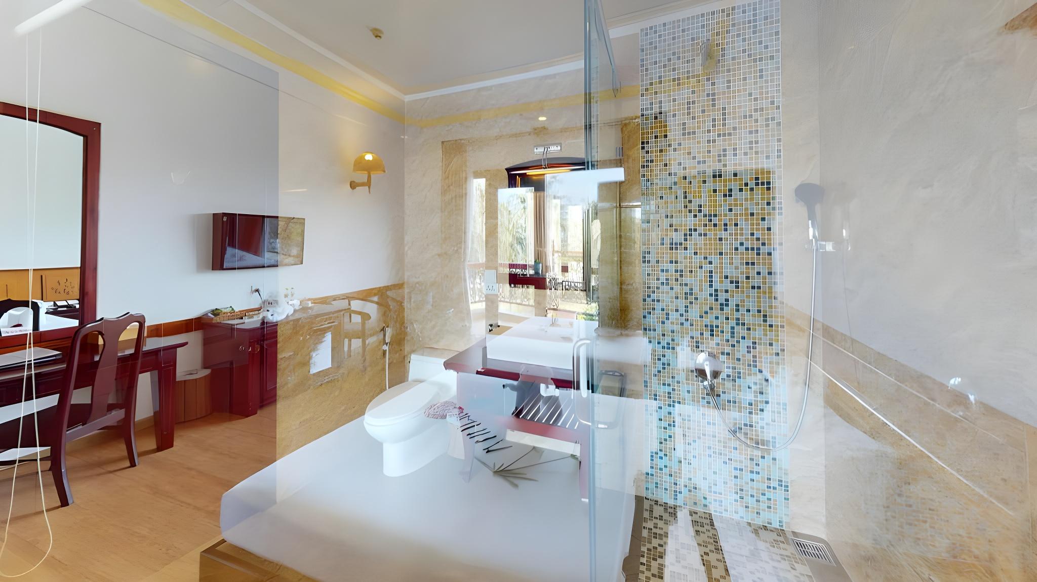 غرفة ديلوكس بسرير كوين وسريرين منفصلين بإطلالة على البحر، Ca Ty Mui Ne Resort 2/2