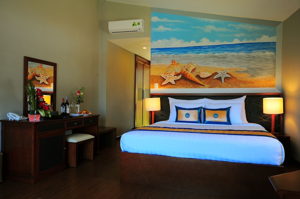 غرفة فاخرة بسرير كينج بإطلالة على الشاطئ، Sandunes Beach Resort Spa 3/7