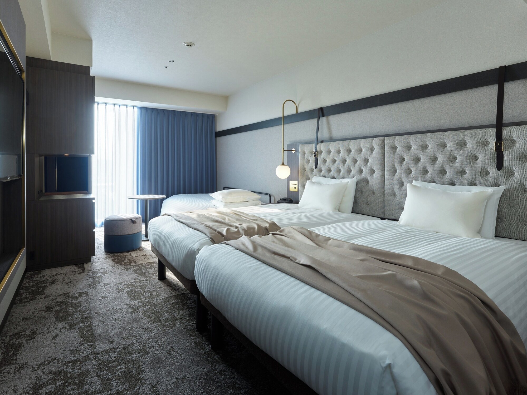 SUPERIOR, 2 BEDS, WITH EXTRA BED, BATHTUB