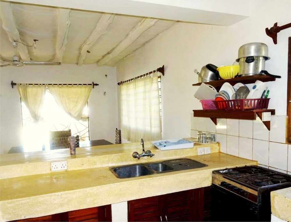 Doric Cottages Diani 50/50