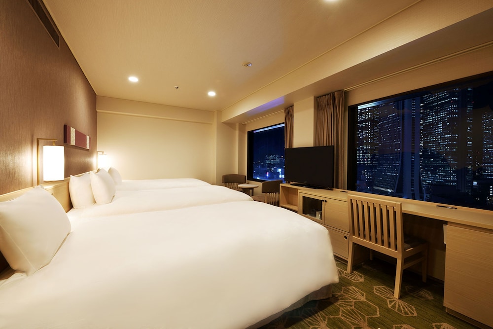 DELUXE, TWIN BEDS, WITH EXTRA BED