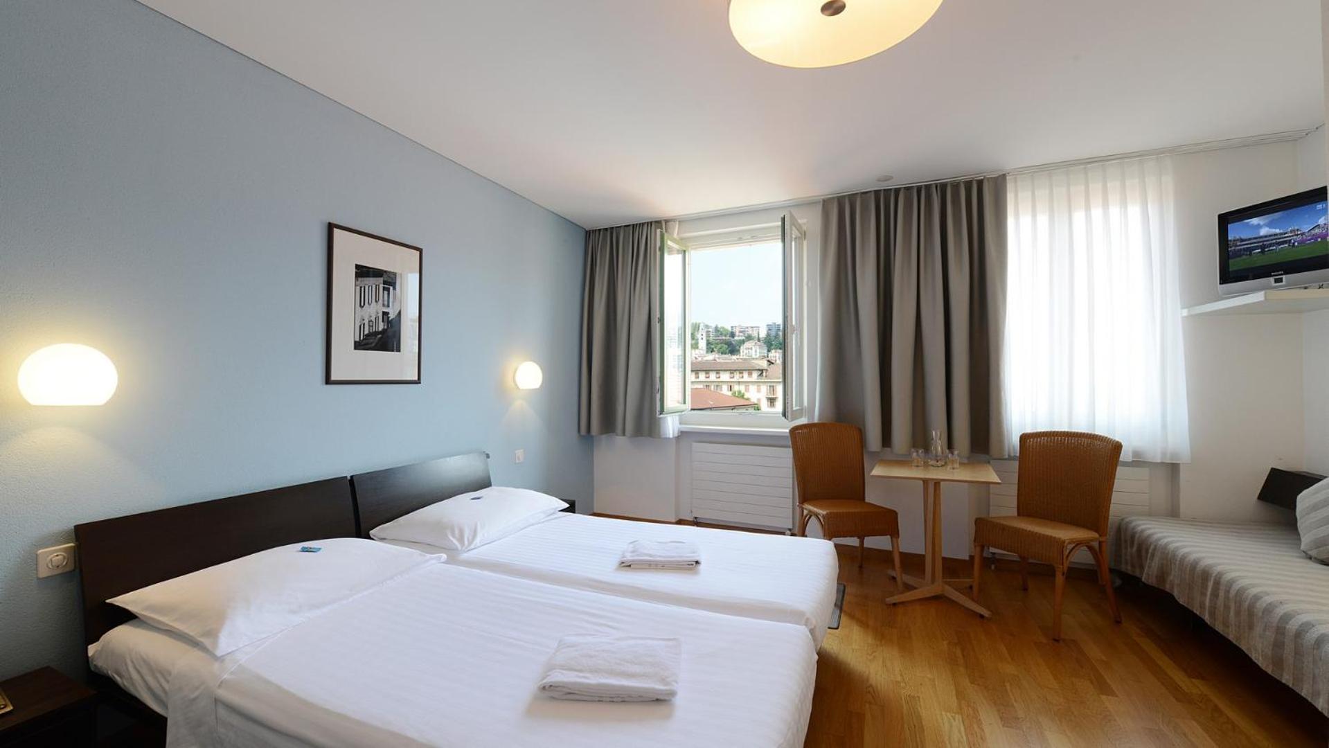 غرفة كلاسيكية عائلية، Hotel Pestalozzi Lugano 2/5