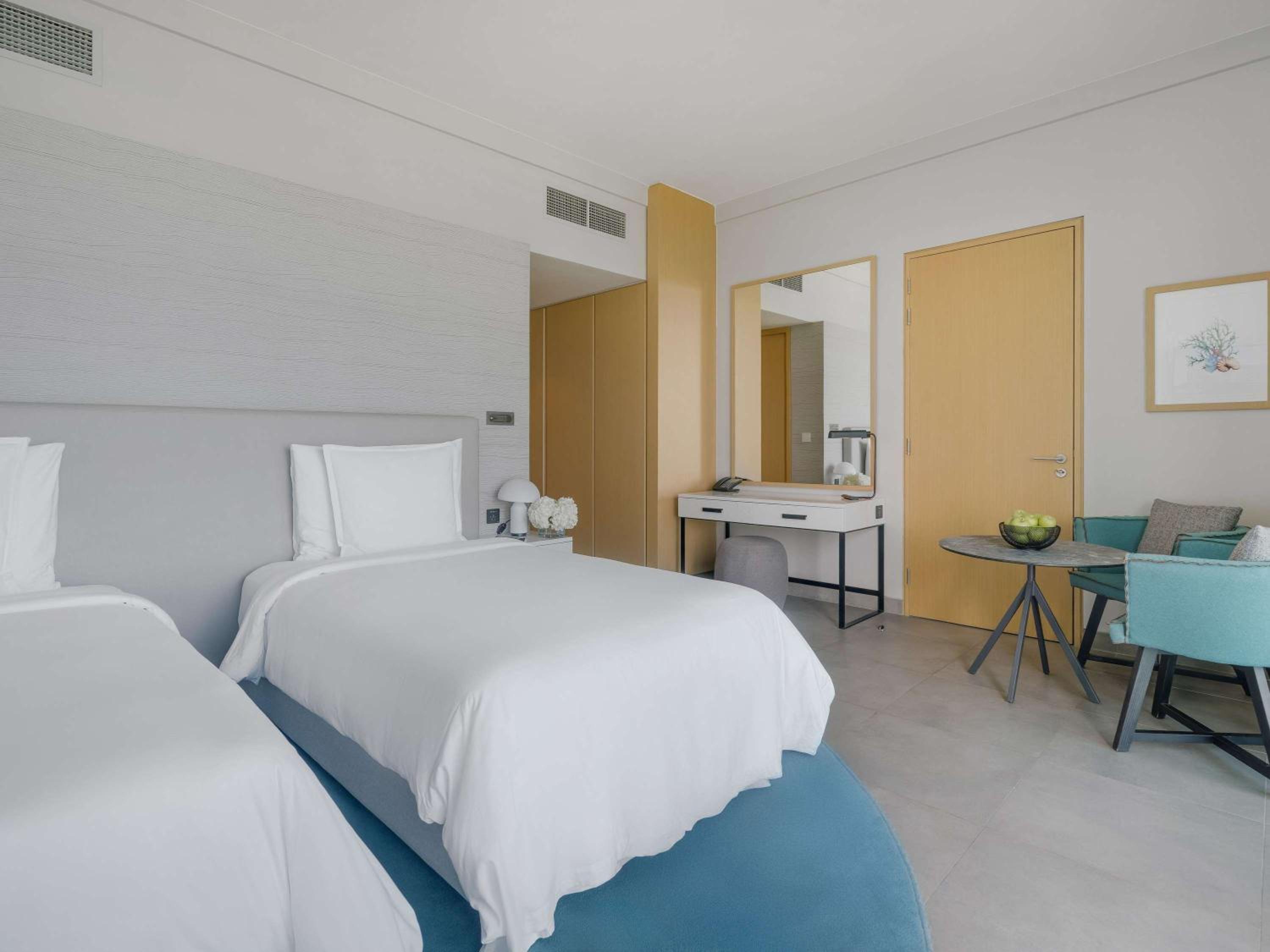Beach, Premium, Twin Beds, with Pool، Movenpick Resort Al Marjan Island 2/12