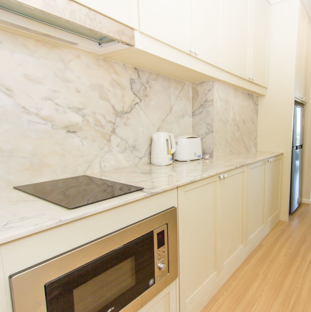 غرفة قياسية بسرير كوين، DLUX Condominium 8/8