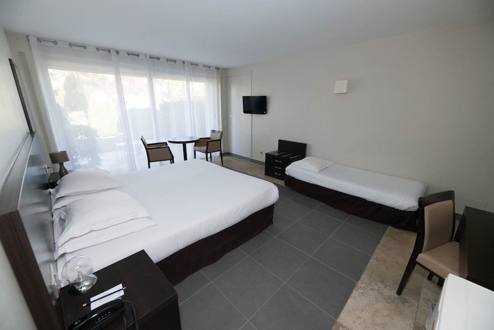 غرفة ثلاثية بسرير كينج وسرير فردي، Domaine de La Petite Isle 5/6