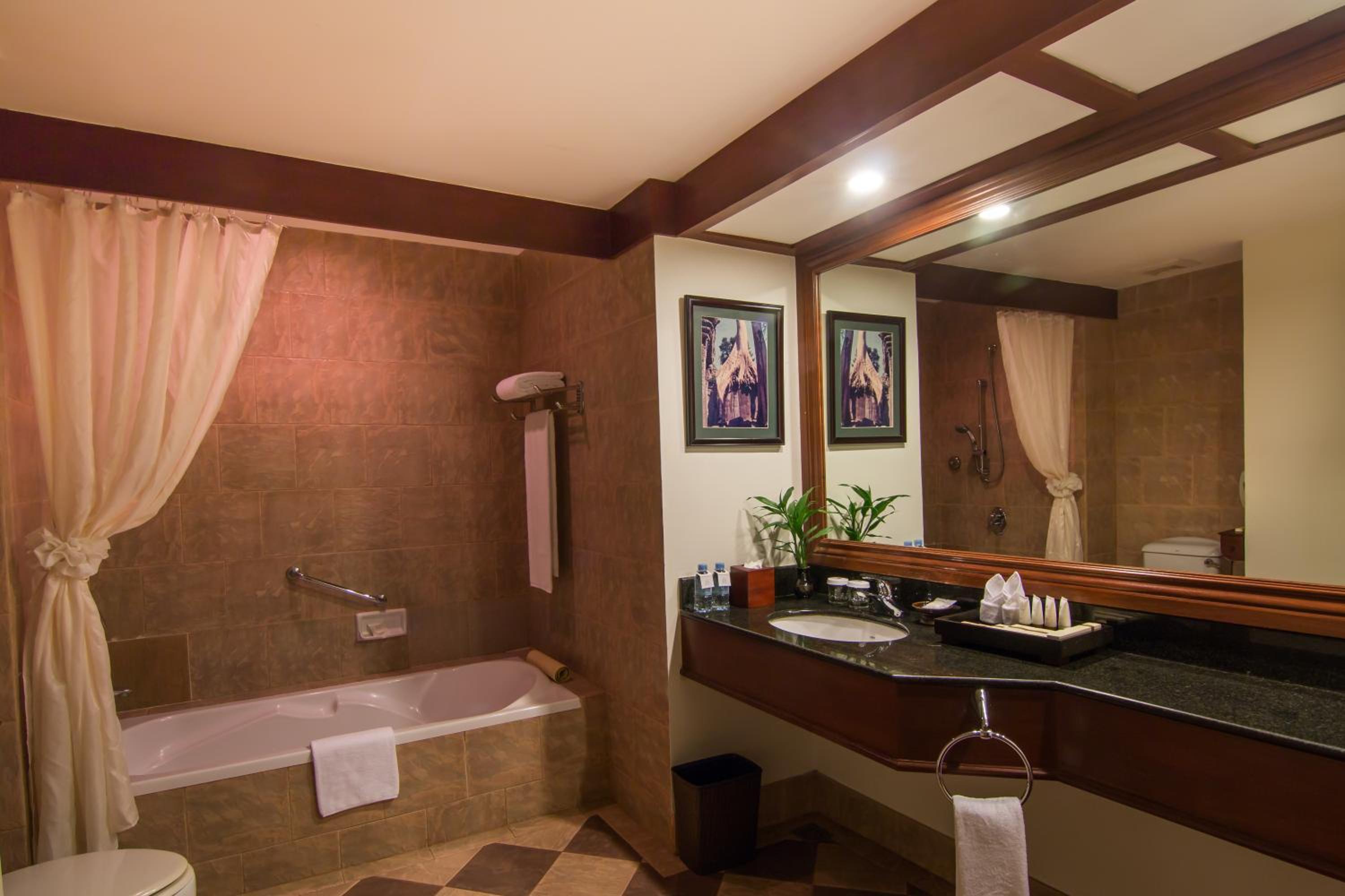 غرفة ديلوكس بإطلالة على المسبح، PALACE RESIDENCE & VILLA SIEM REAP 8/9