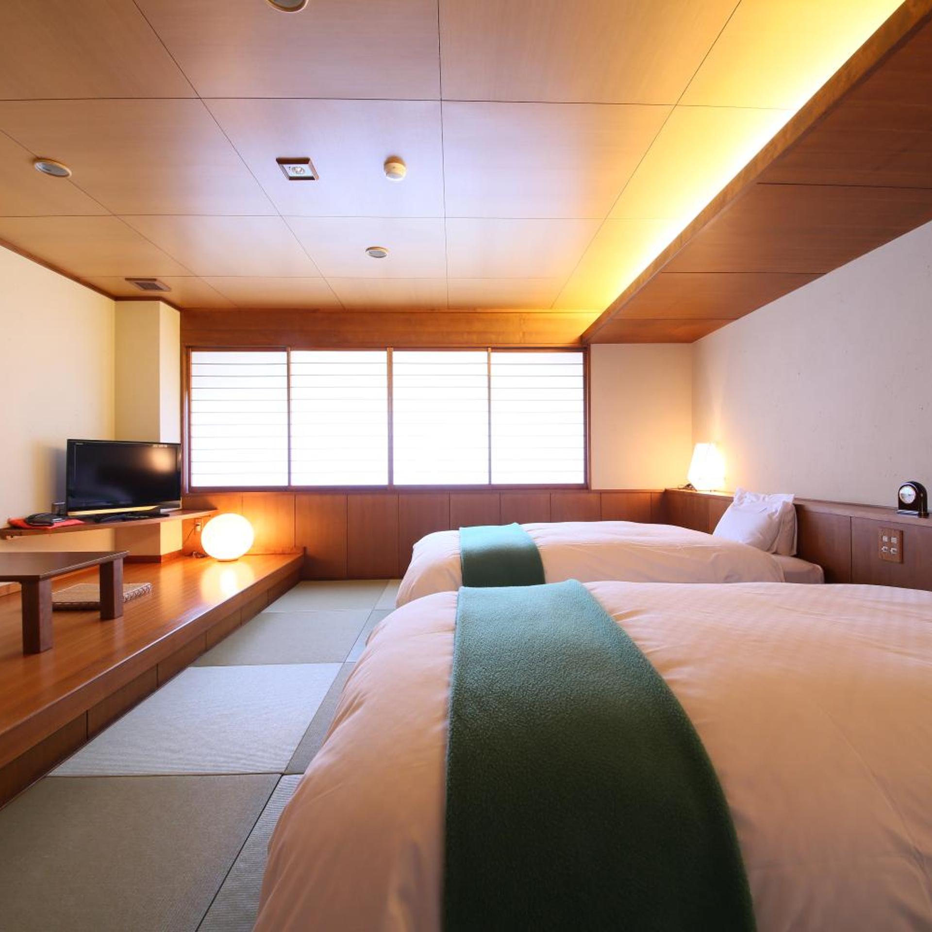 غرفة بسريرين منفصلين بأرضية تاتامي، Hotel Tamanoyu 4/10