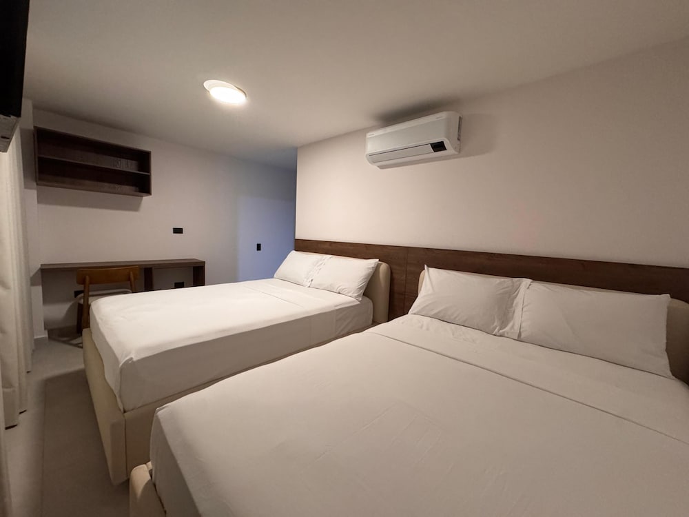 Economy, 2 Double Beds, City View, Balcony