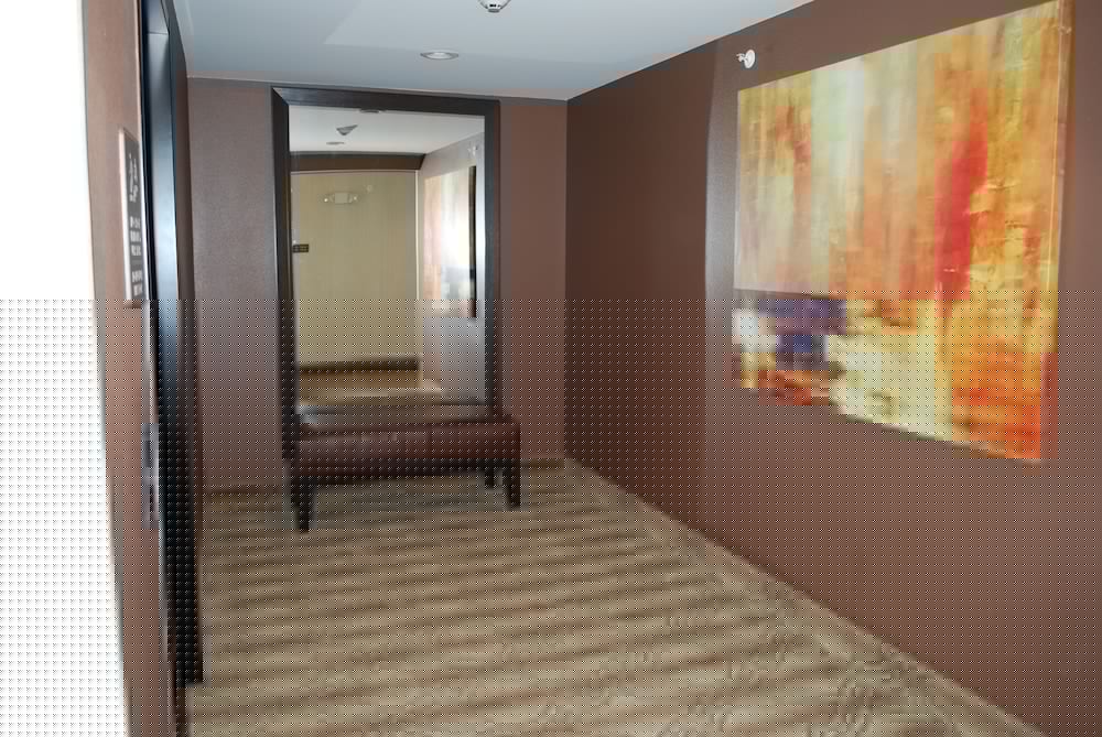 Landmark Suites 12/50