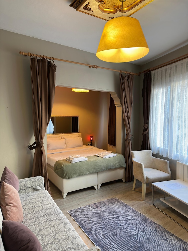 غرفة عائلية رباعية بسرير كوين وأسرّة بطابقين مع أريكة، Chez Bore Boutique Hotel 8/10