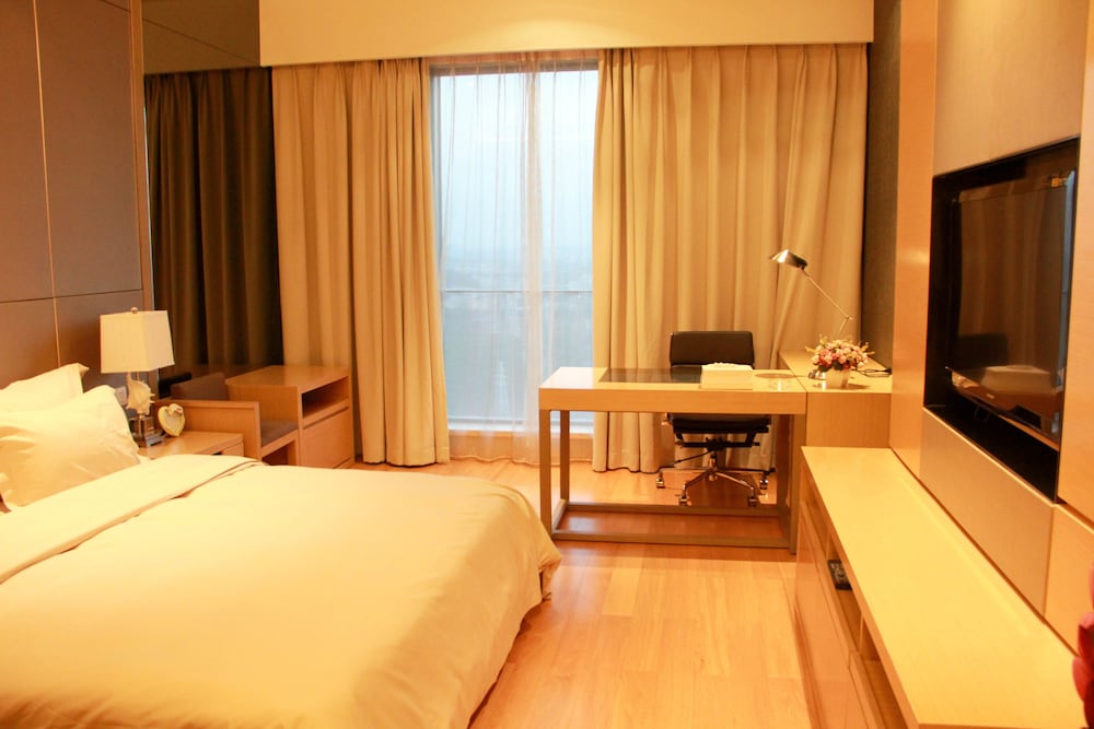 Xingyi International Hotel Poly Store 29/70