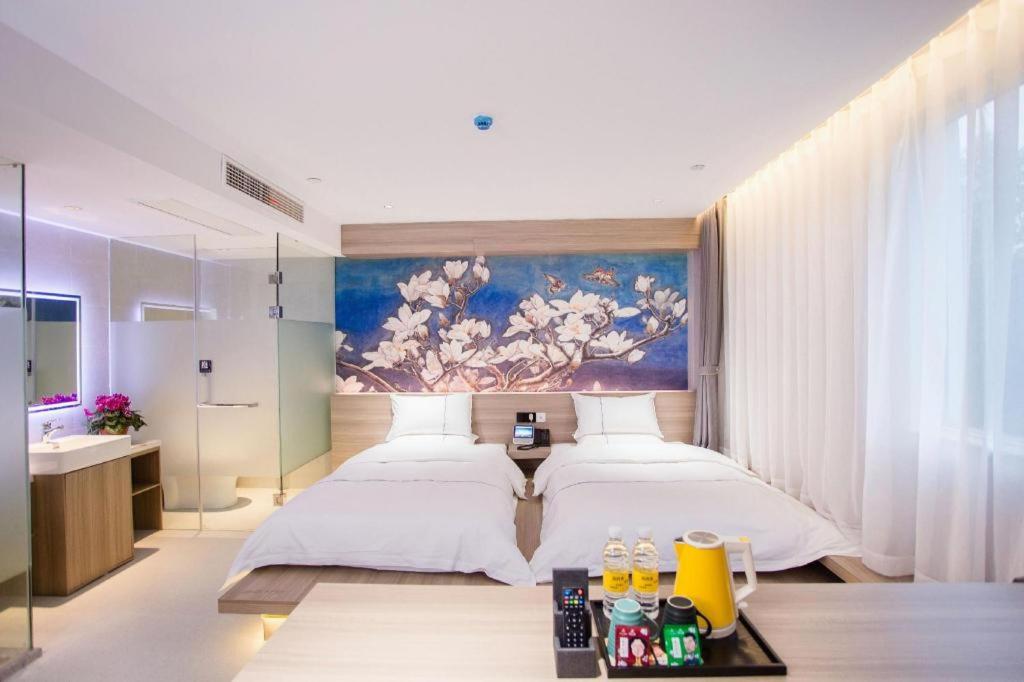 Magnolia Hotel (Yixing bus station store) 29/64