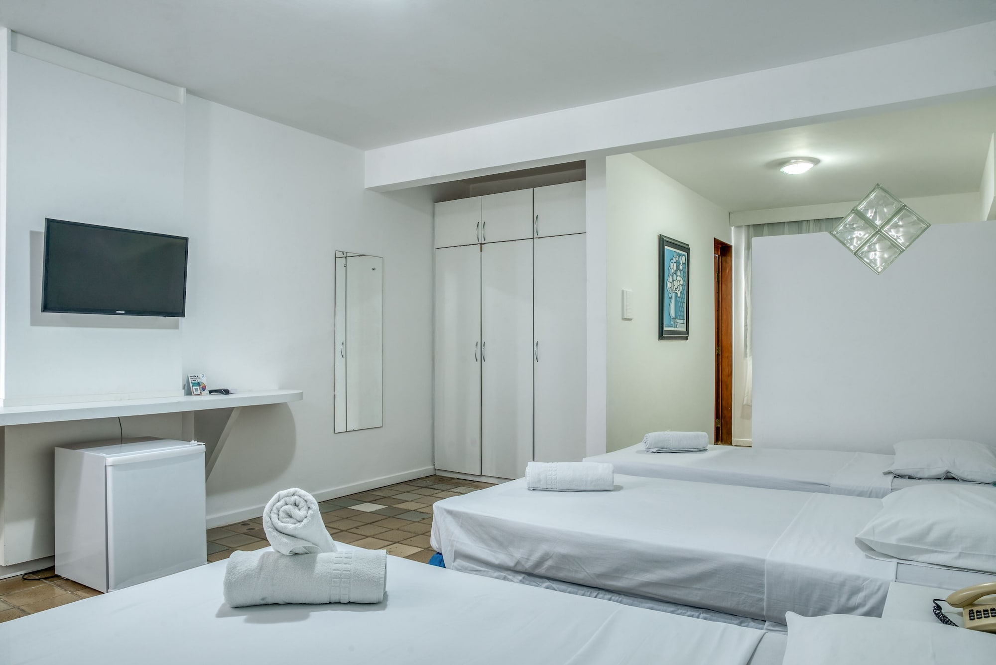 غرفة قياسية رباعية بسرير مزدوج وسريرين منفصلين، Praia Hotel Enseada 3/9
