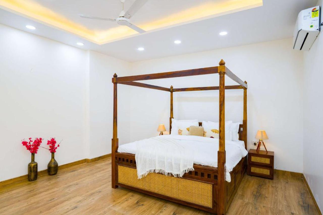 ELIVAAS AdhiVa Retreat 5 BHK Farmhouse with Pvt Pool, Bar & Lush Garden 8/15