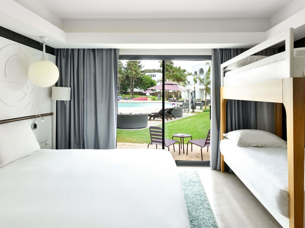 غرفة عائلية بسرير كينج وأسرّة بطابقين، Hotel Royal Golf and Spa Mazagan 3/8