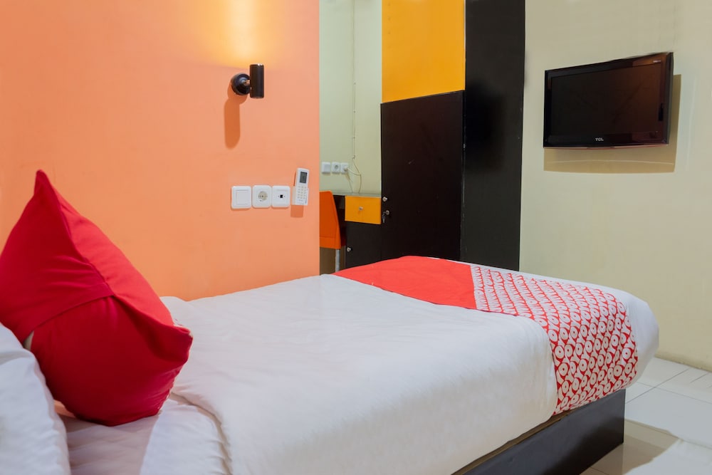 Oyo 989 Audah Guesthouse Syariah 16/36