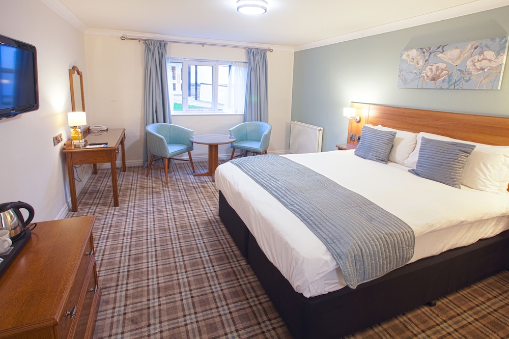 كوخ تنفيذي بسرير كينج