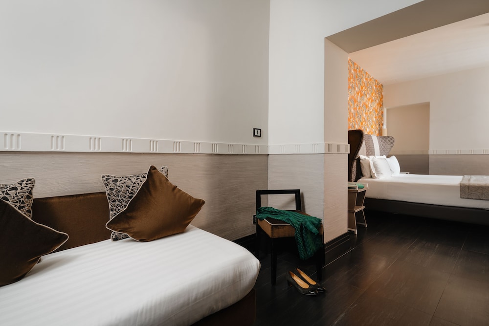 غرفة ديلوكس بسرير كينج وسرير فردي، Unica Suite Rome 4/6