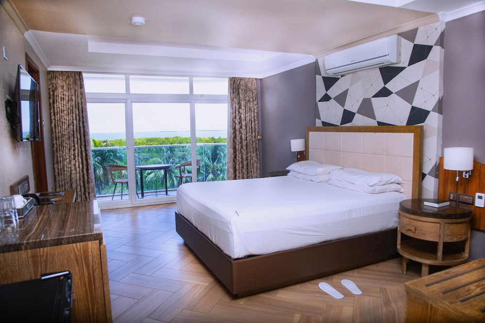 جناح جونيور بسرير مزدوج وسرير فردي، Tanga Beach Resort & Spa 6/10