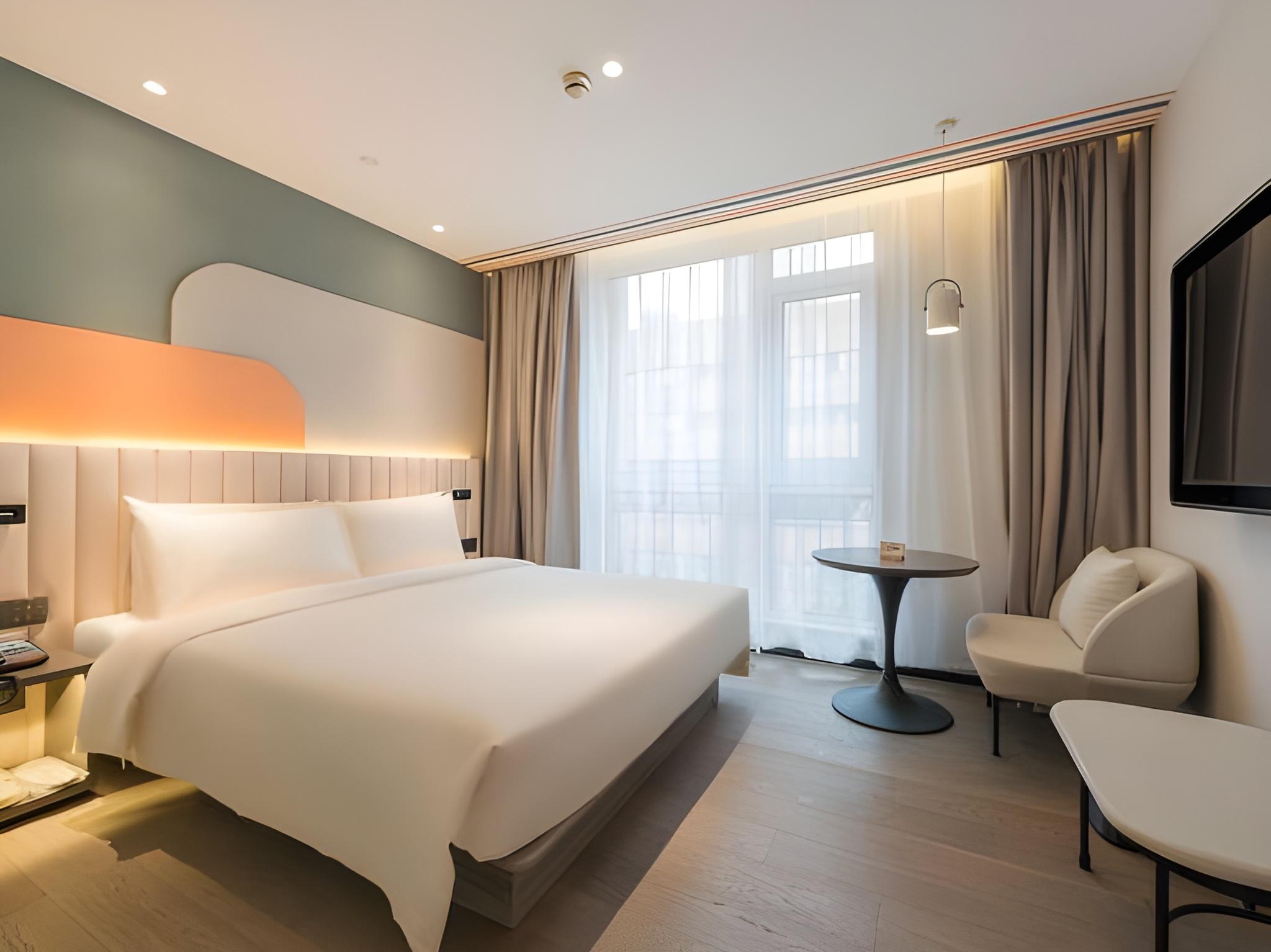 غرفة تنفيذية بسرير كينج وسرير كوين