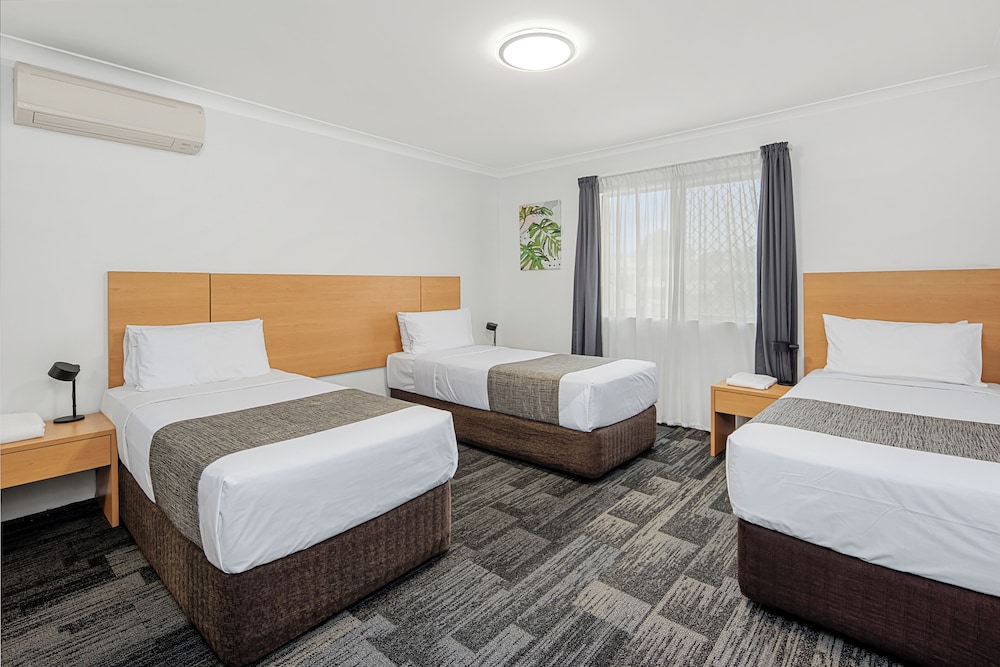 شقة تنفيذية بسرير كينج وثلاثة أسرّة بغرفتي نوم