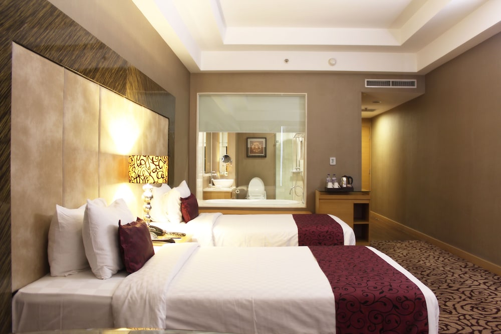 غرفة ديلوكس بسريرين منفصلين للمدخنين، Wyndham Surabaya City Centre 3/7