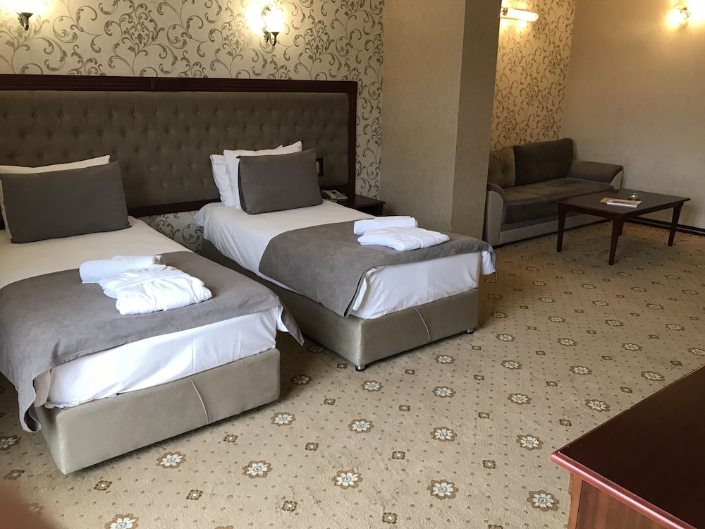 غرفة كومفورت رباعية بأربعة أسرّة، Capitol Hotel 3/7