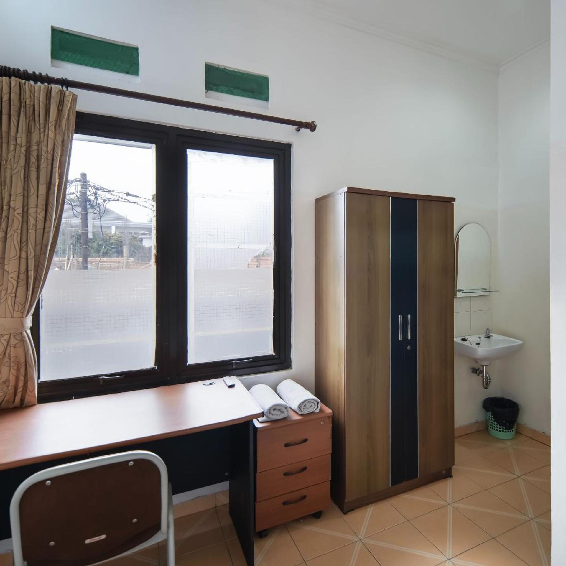 OYO 196 Horizone Residence 21/22