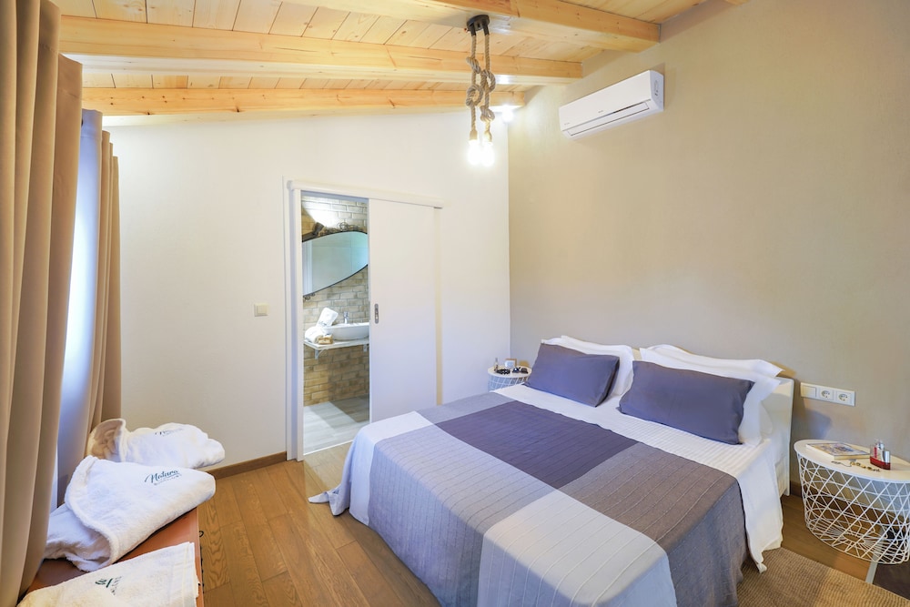 Natura Bungalows 7/50