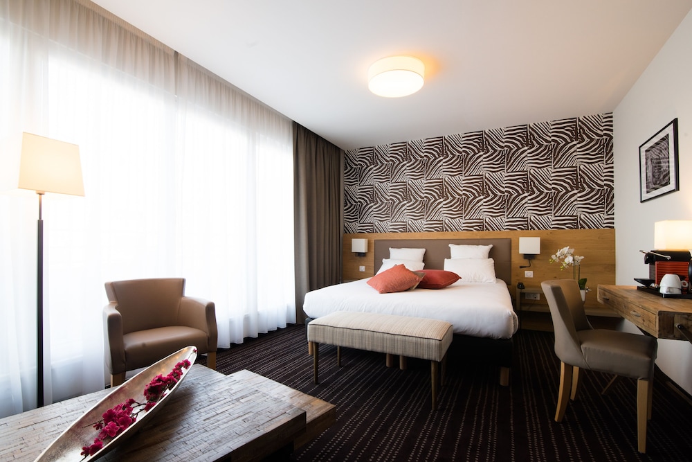 Brit Hotel Lodge 9/50