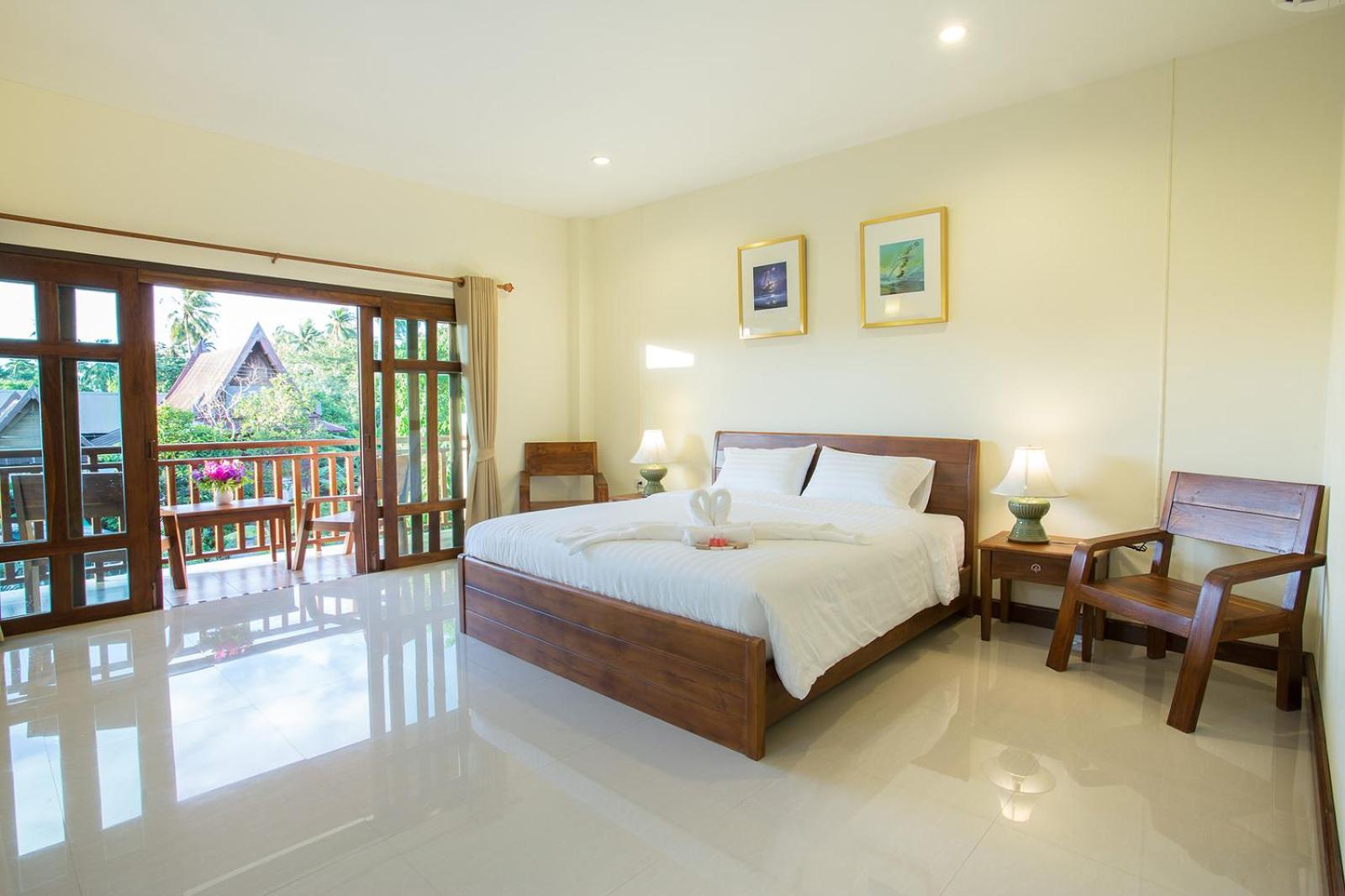 غرفة عائلية بسرير فردي بشرفة