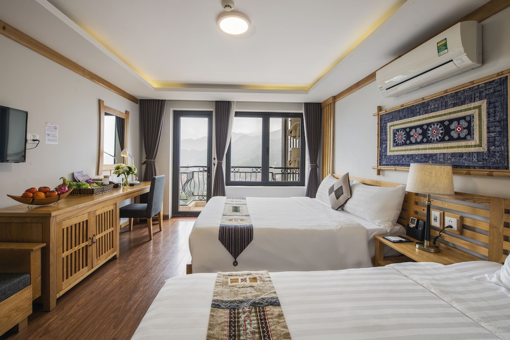 DELUXE, TRIPLE, 1 DOUBLE AND 1 SINGLE BED