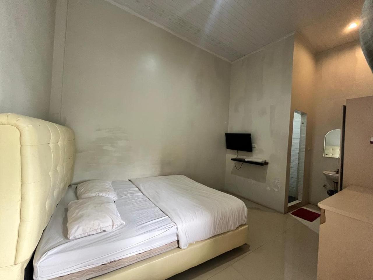 Hotel O near Universitas Sumatera Utara formerly Aljadid Guest House Pajus 18/45