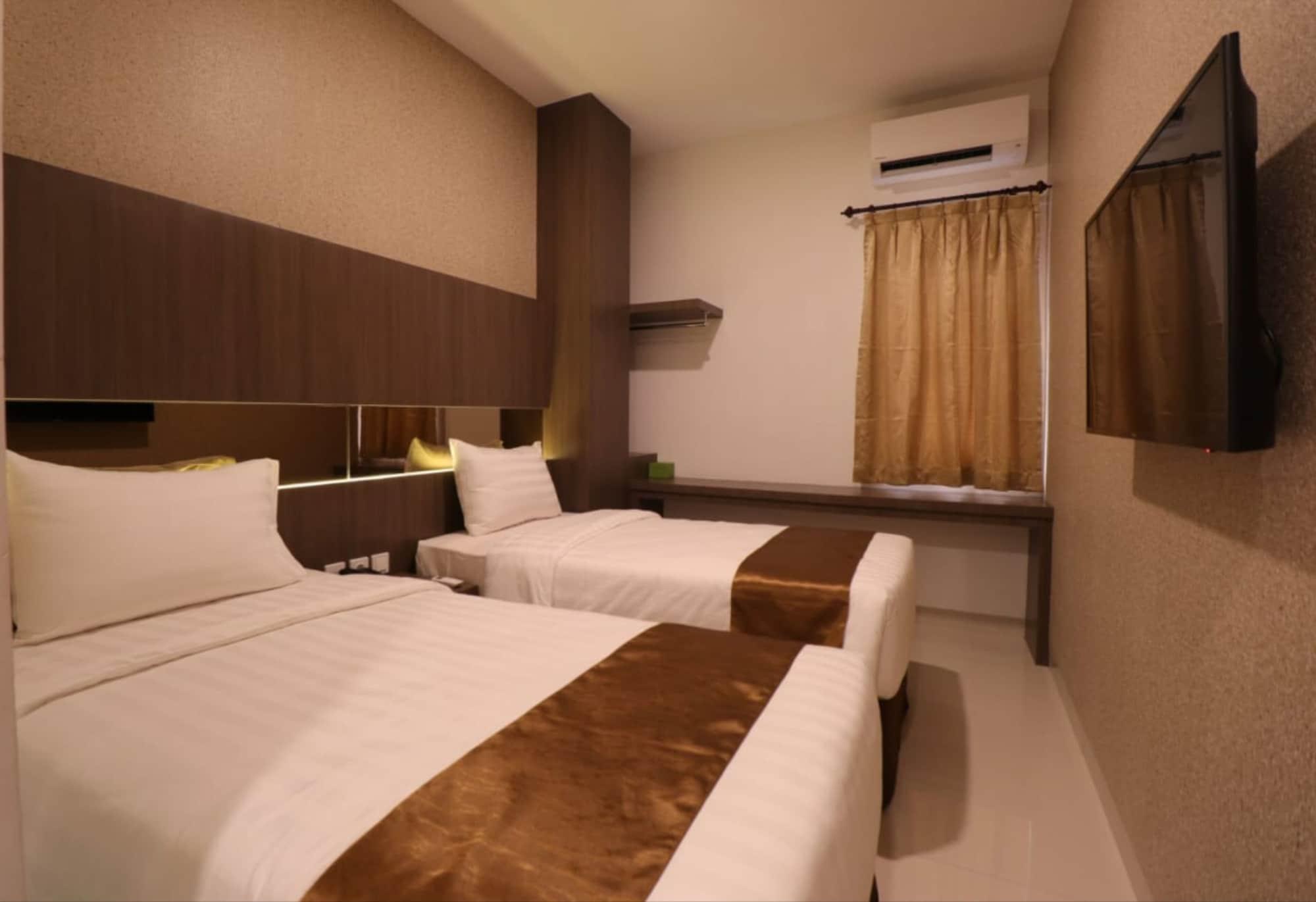 Nivia Hotel Medan 16/25