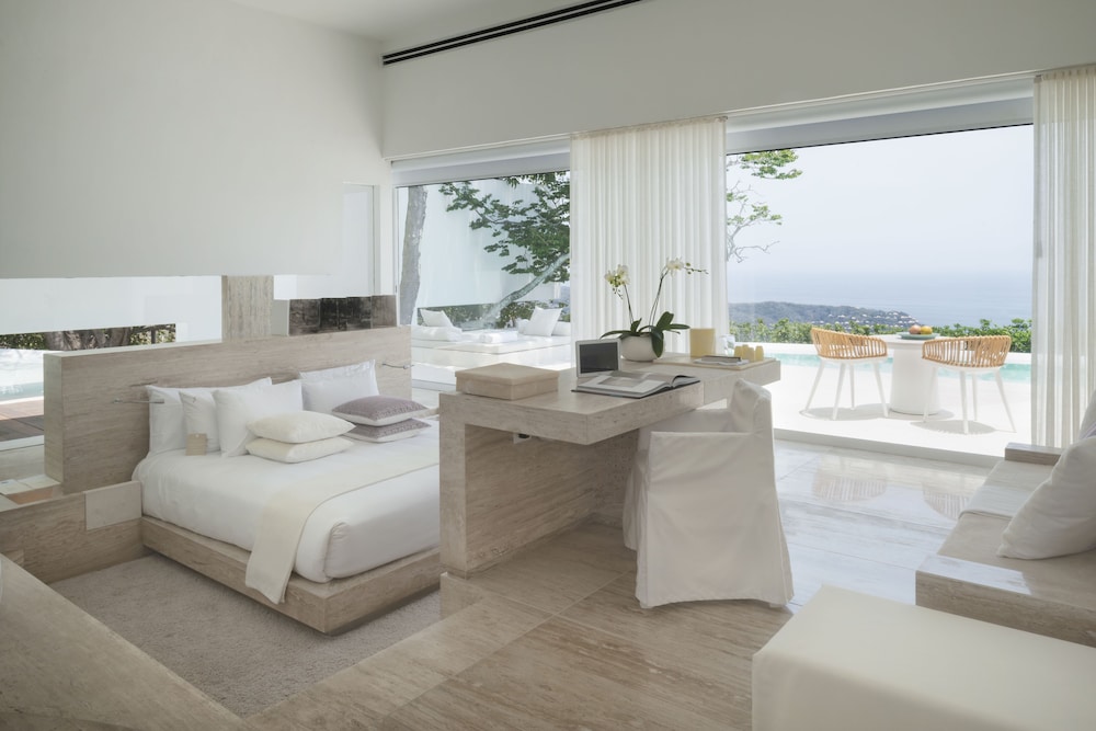 Encanto Acapulco 34/76