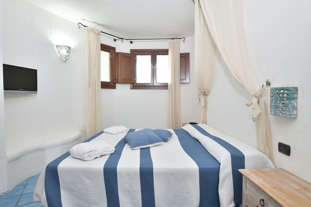 Hotel Resort And Spa Baia Caddinas 14/50