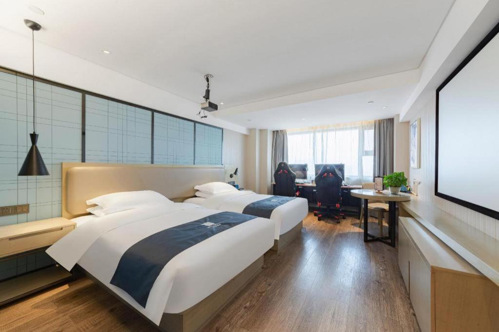 Echarm Hotel (Wuhan Huangpi) 35/70