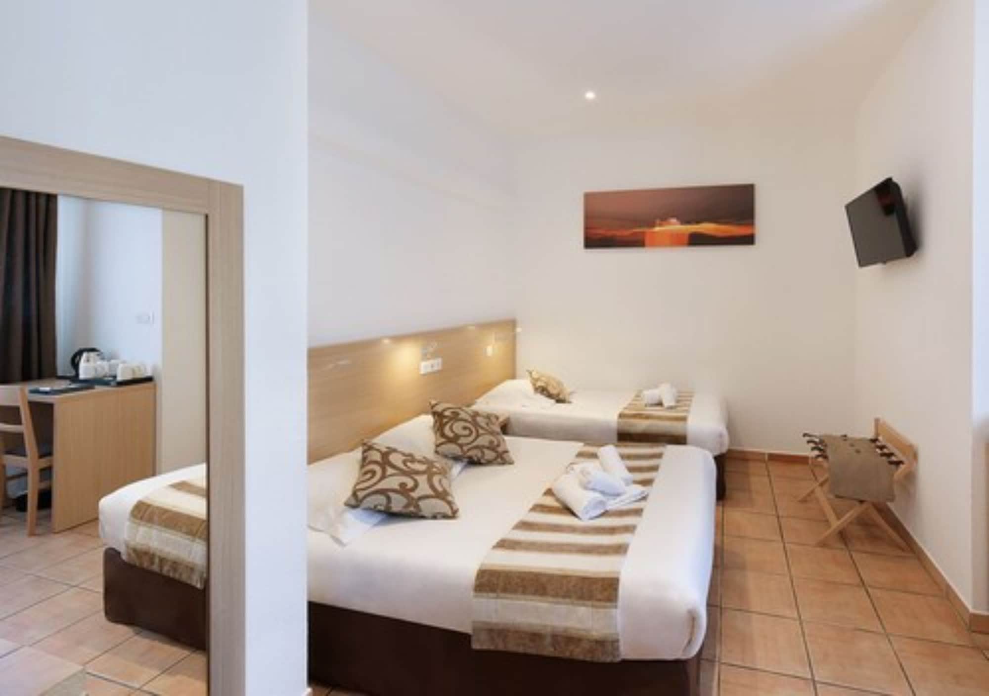 Family, 1 Double and 3 Single Beds