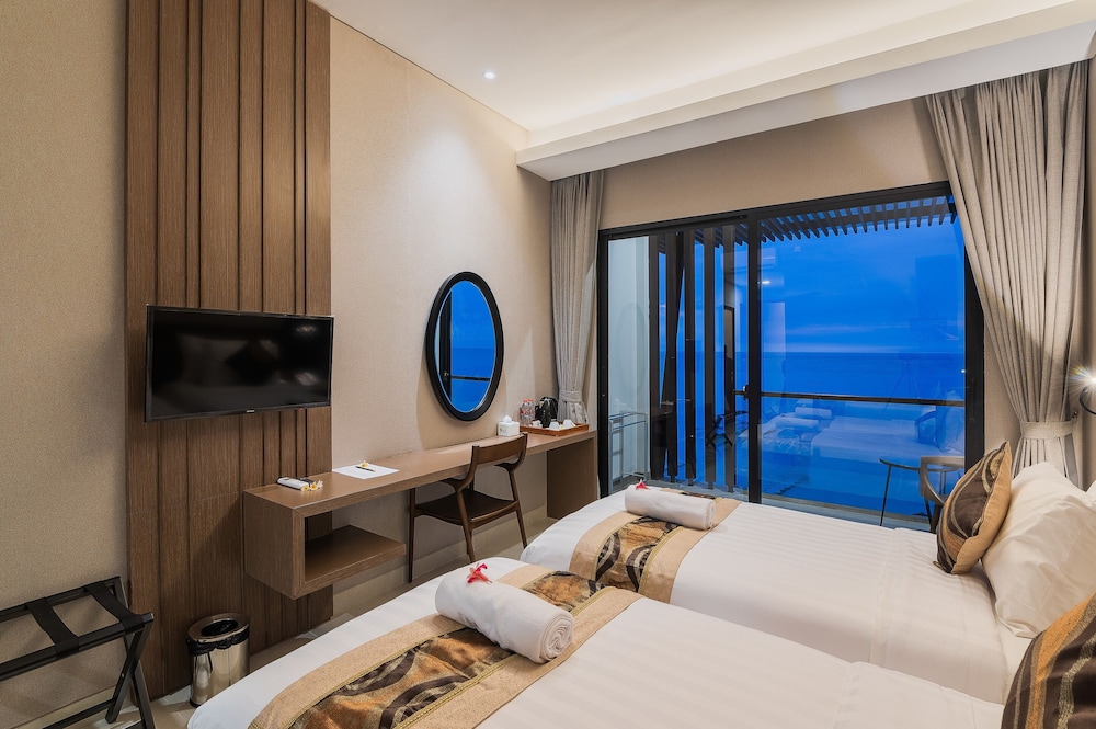 غرفة بريميوم ديلوكس بسريرين منفصلين بإطلالة على البحر، Padma Sari Hotel 2/3