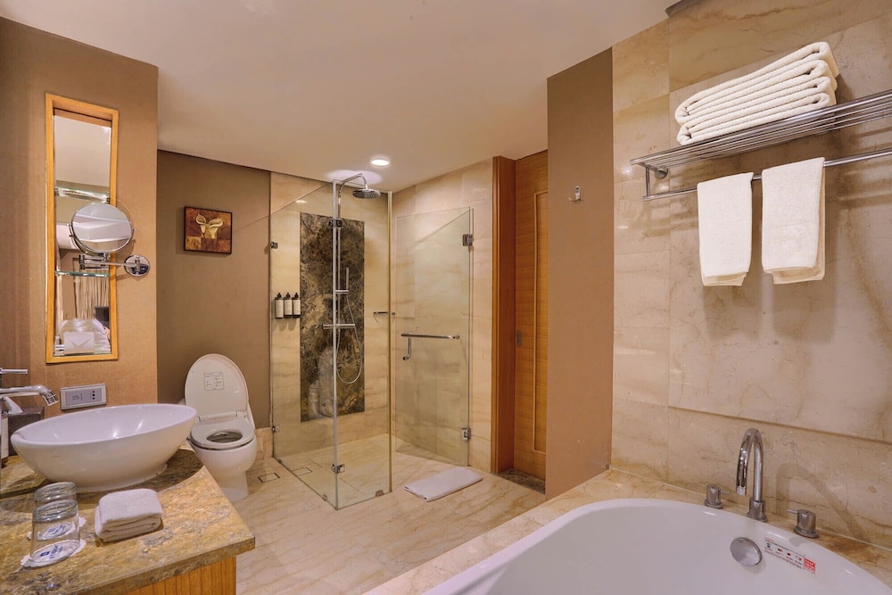 غرفة ديلوكس بسريرين منفصلين للمدخنين، Wyndham Surabaya City Centre 4/7