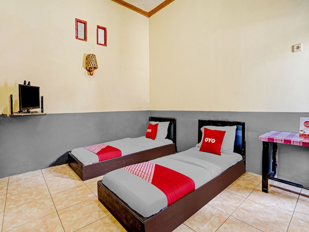 OYO 90405 Penginapan Sasti Kuningan 9/15