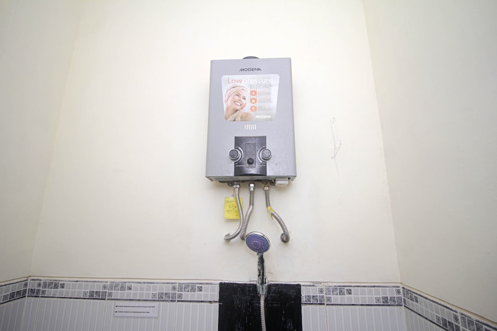Super OYO Capital O 2258 Santana Syariah Guest House 27/41