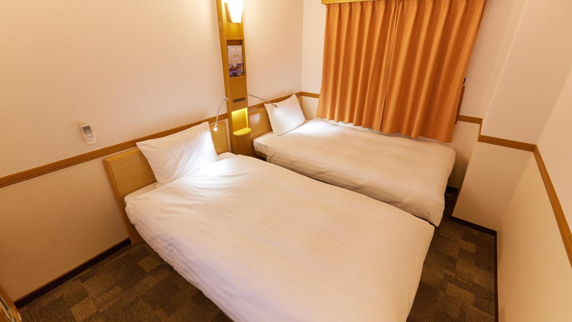 غرفة بسريرين منفصلين للمدخنين، Toyoko Inn Nagoya Eki Shinkansen Guchi 8/8