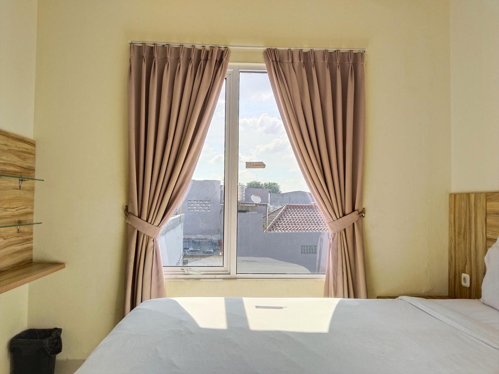 غرفة بسرير مزدوج، Oyo 115 Portal Residence 2/5