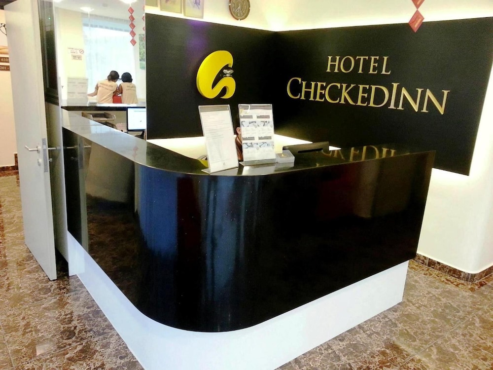 Capital O 90714 Hotel Checkedinn 8/38