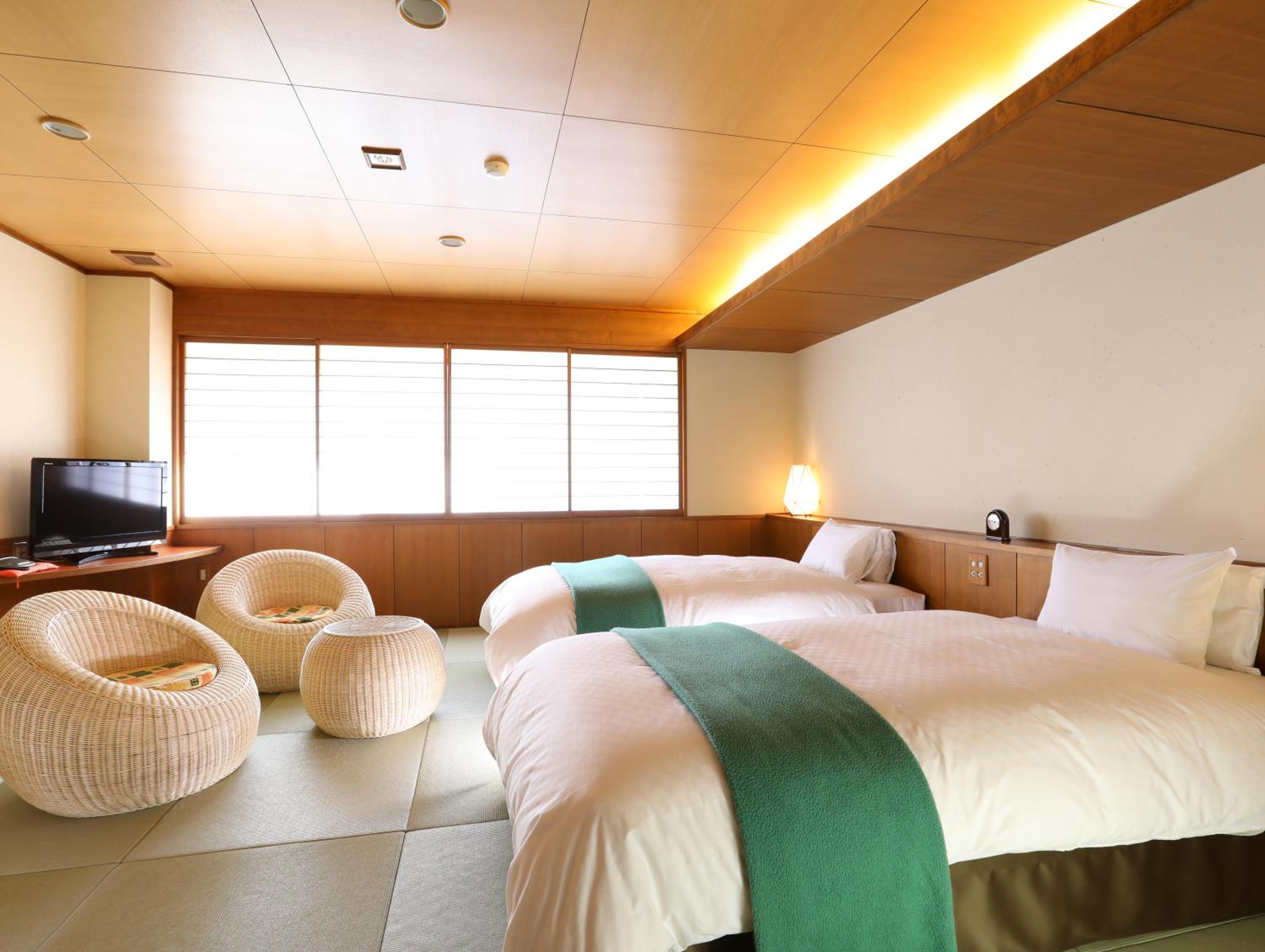 غرفة بسريرين منفصلين بأرضية تاتامي، Hotel Tamanoyu 8/10