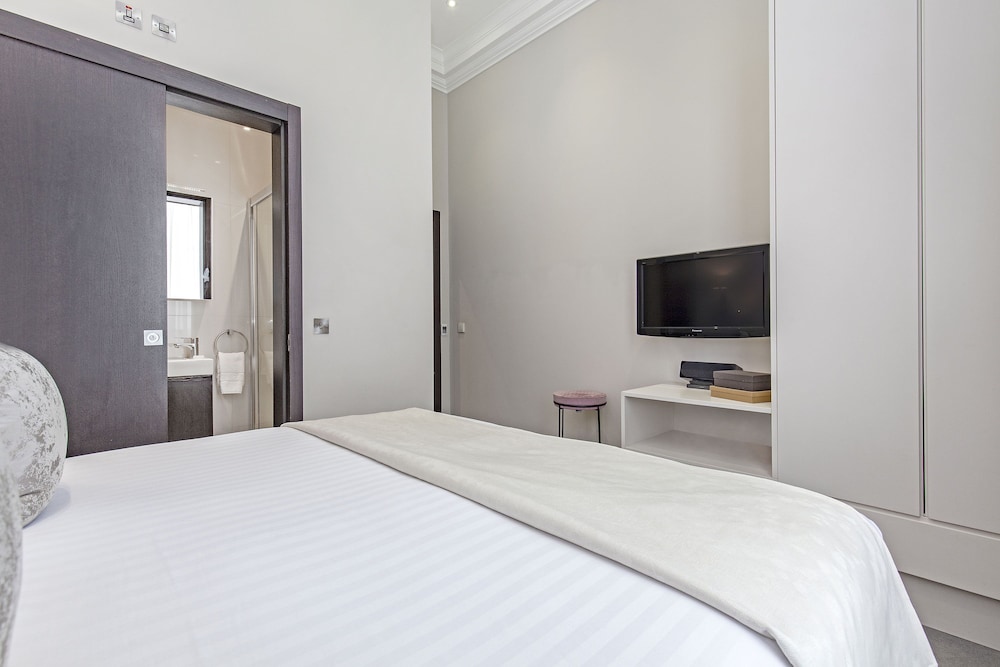شقة ديلوكس بسرير كينج وسرير كوين وسريرين منفصلين بـ3 غرف نوم، 130 Queensgate Apartments 5/9
