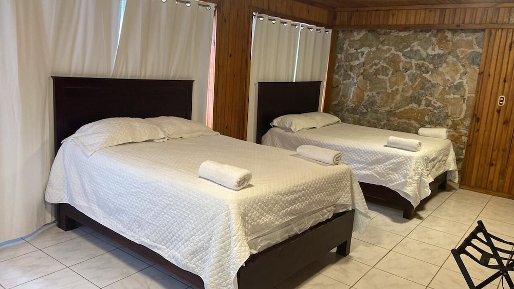 Rock, House, 1 Single and 2 Queen Beds